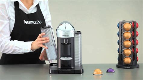 Fill the water tank with the descaling solution and place it back on the machine. . Descale nespresso vertuo next